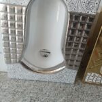 سنگ توالت سفید طلایی ریم بسته